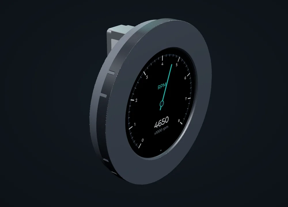 The assembled can2gauge: the 52 mm body and bezel, with the RPM needle page on the screen